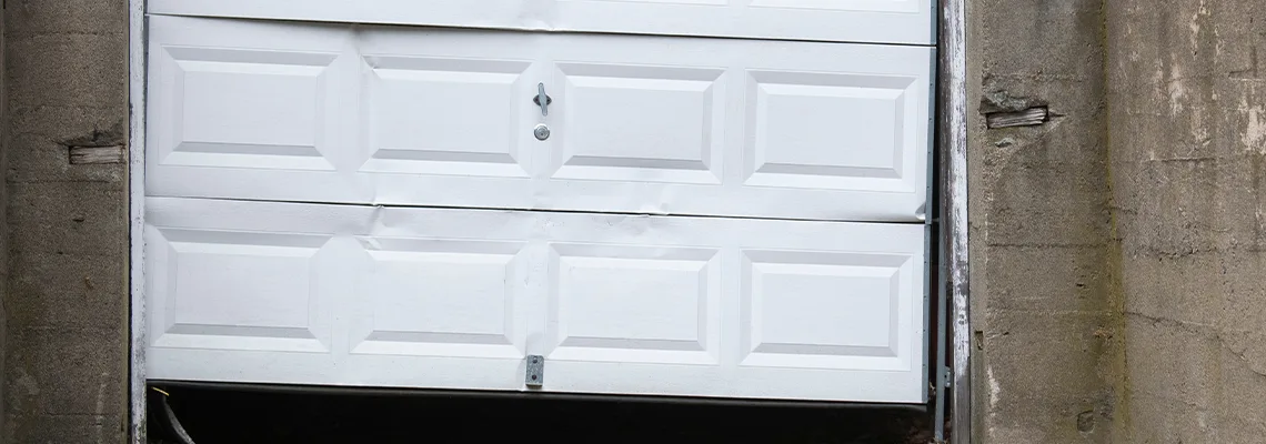 Garage Door Got Hit By A Car Dent Removal in Newmarket, ON