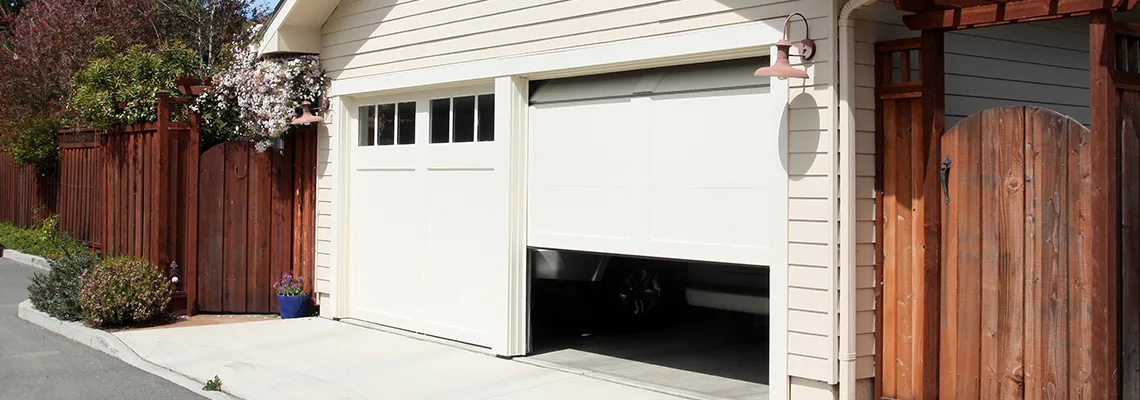 Fix Metal Garage Door Jerking in Newmarket, Ontario